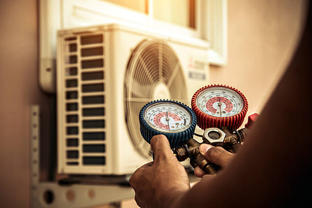 Professional Air Conditioning Service technician working in Waterloo, IL